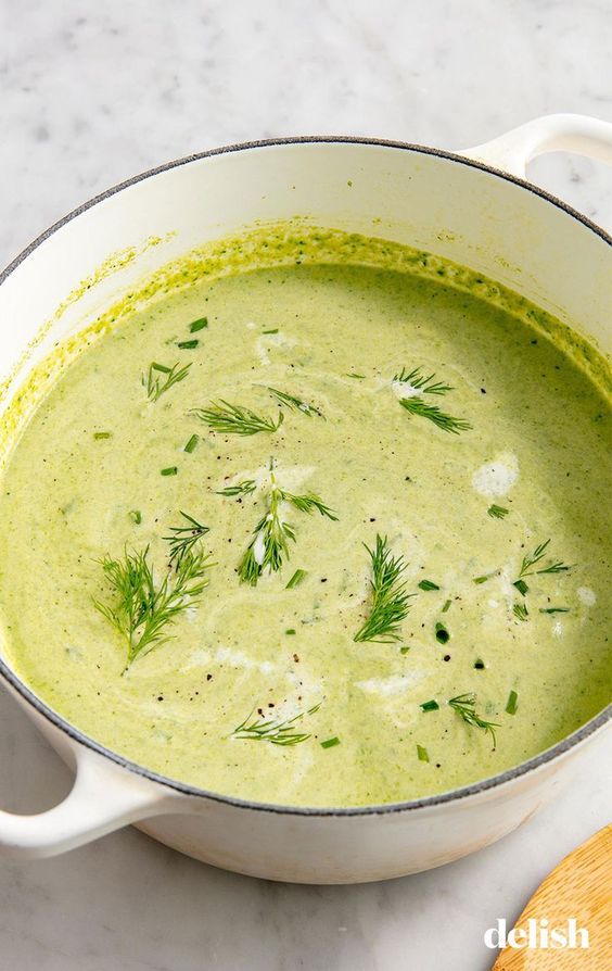 Cream of Asparagus Soup in a Bowl Sprinkled with Chives and Dill