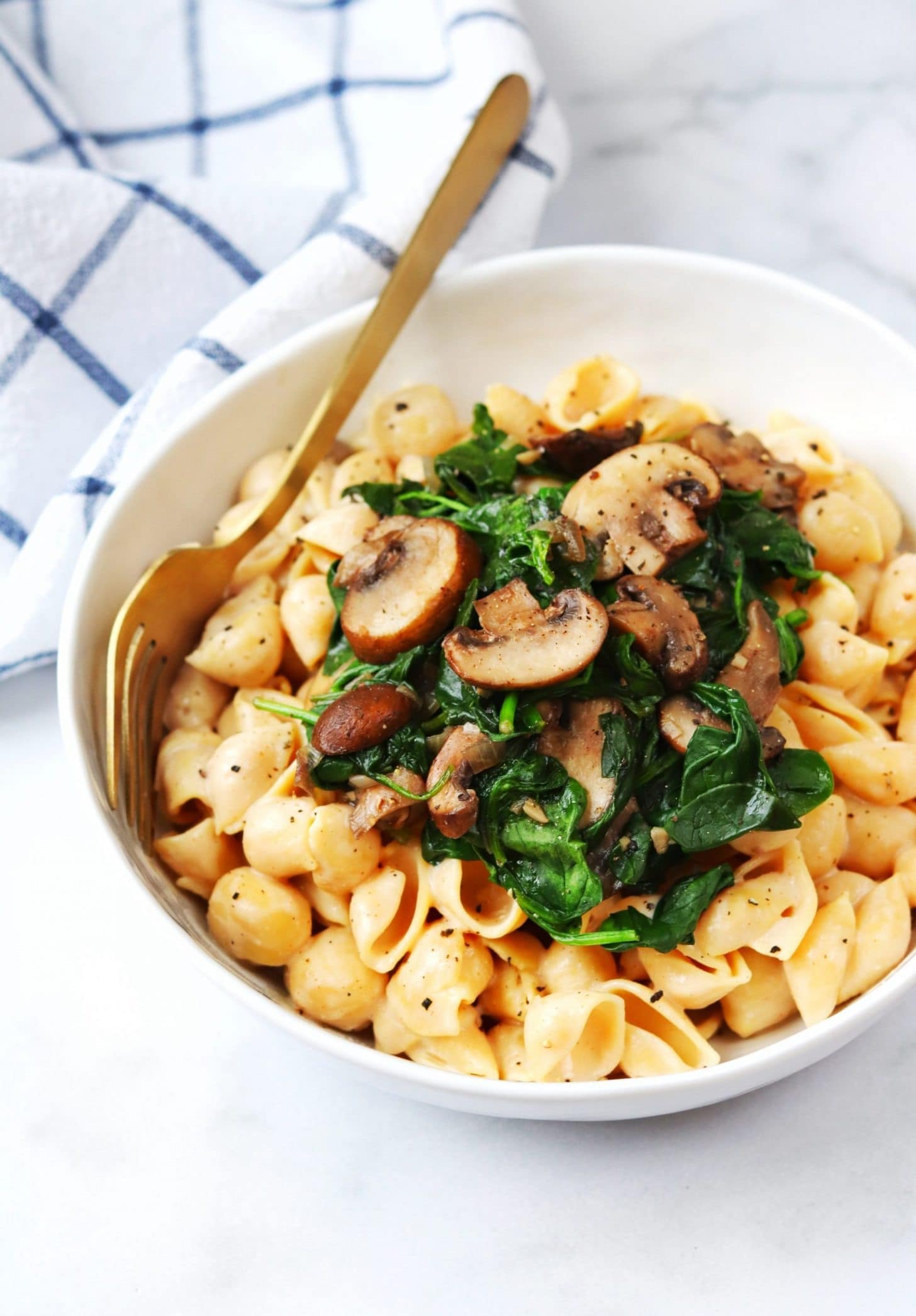 Bowl of Creamy High Protein Mushroom and Spinach Pasta