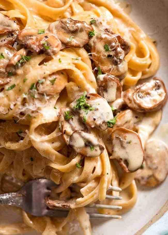 Creamy Mushroom Pasta with Herbs in a Plate