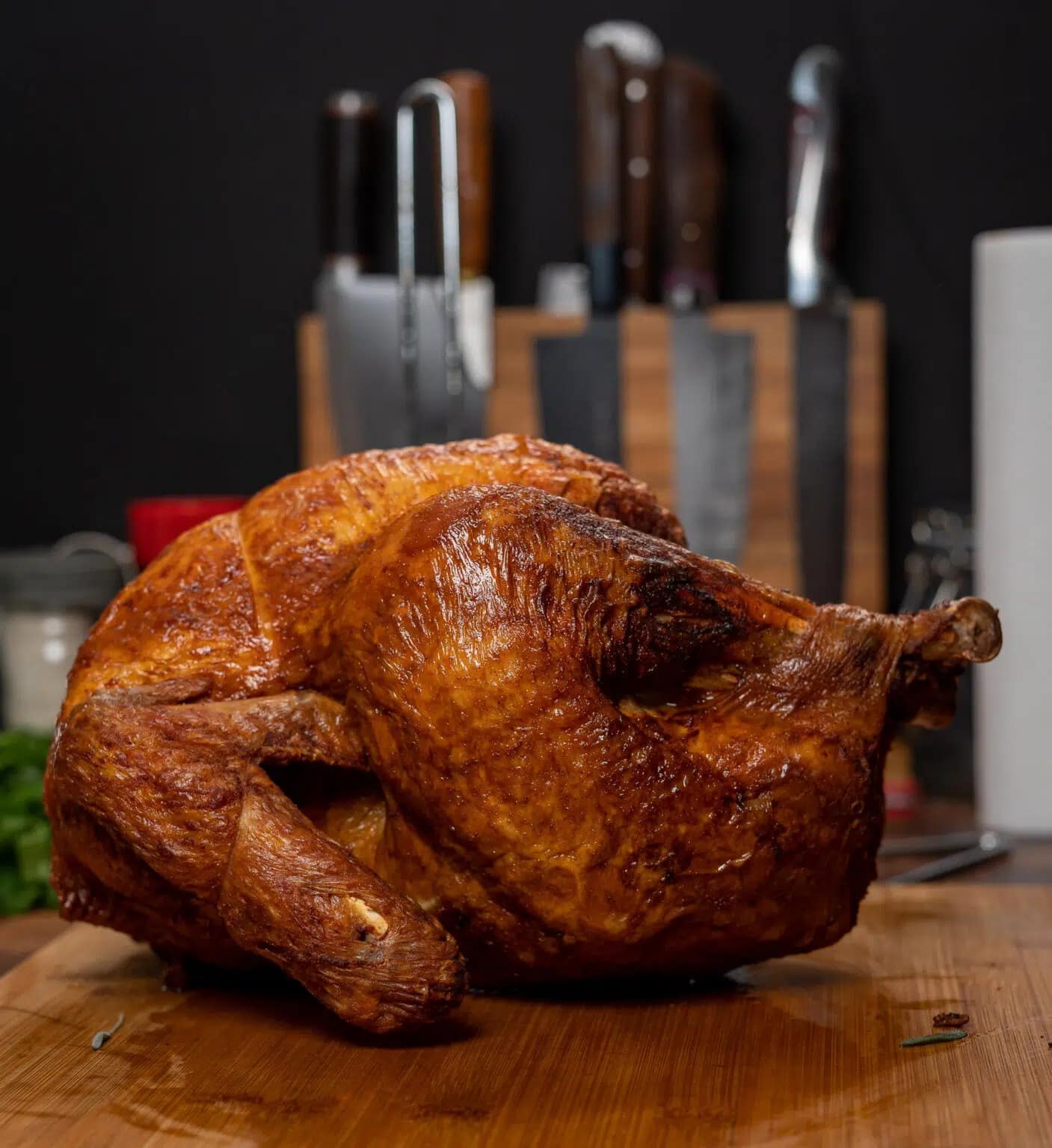 Whole Deep-Fried Turkey on a wooden cutting board