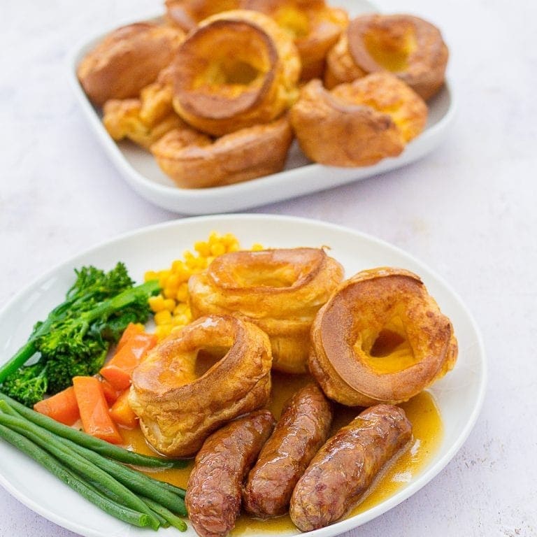 Yorkshire pudding served with beans and sausage. 