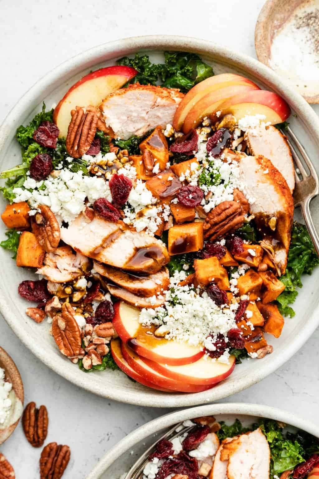 Fall Harvest Salad with roasted sweet potatoes, cranberries, chopped pecans, goat cheese, chicken, and Honeycrisp apples.