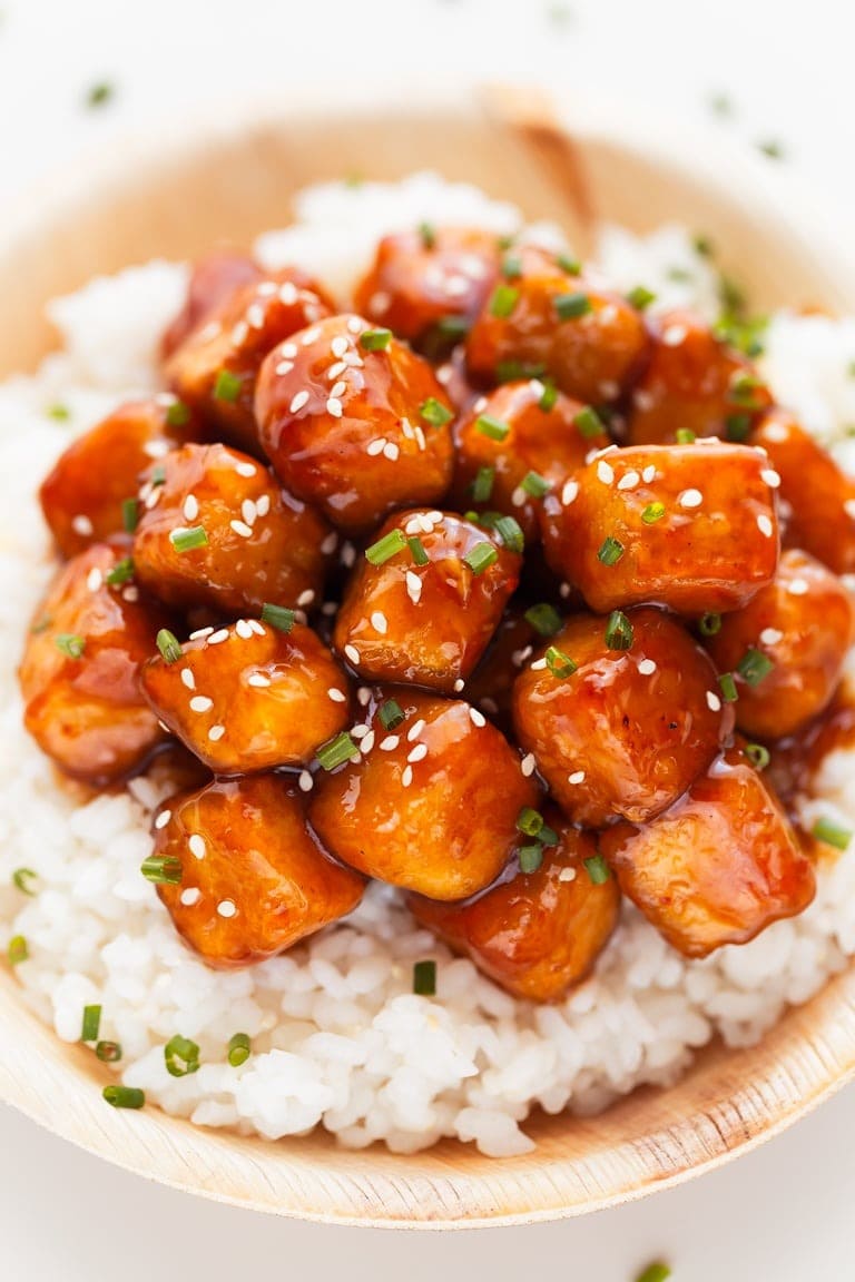 Homemade Saucy Generaly Tso's Tofu Served with Rice in a Bowl