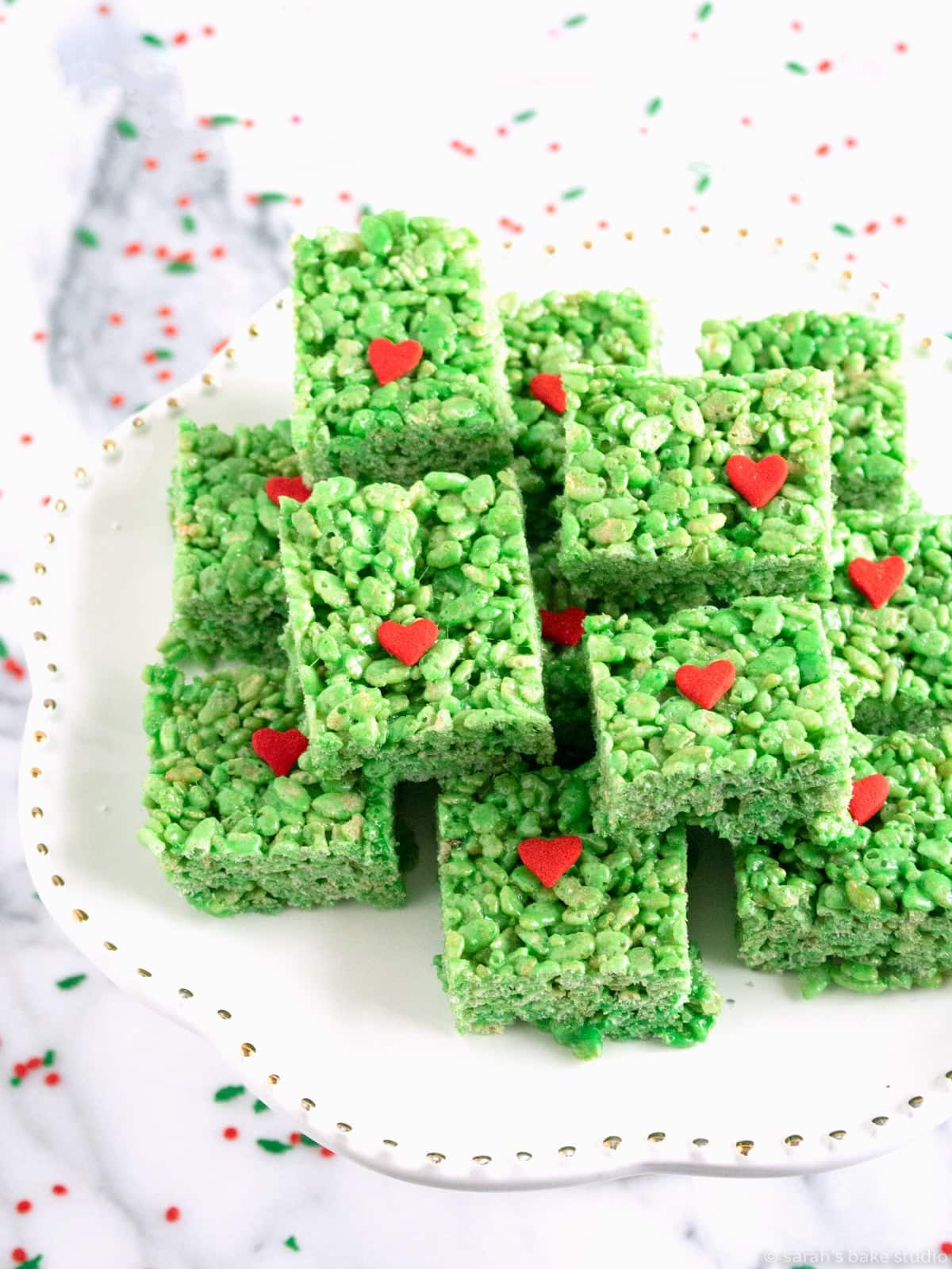 Grinch Rice Krispies Treats Topped with Red Heart-Shaped Candies
