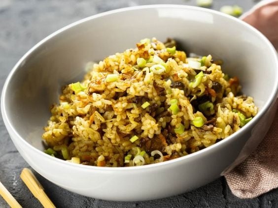 Bowl with ground beef rice. 