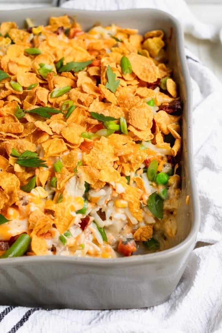 Chicken casserole in baking dish. A delicious meal with chicken, vegetables, and creamy sauce baked to perfection