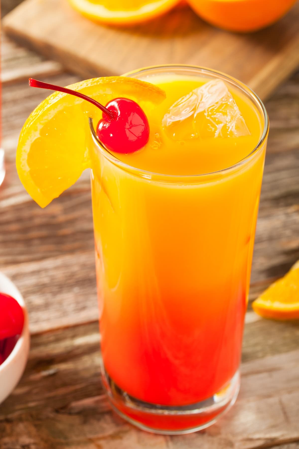 Homemade Tequila Sunrise with Orange and Cherry