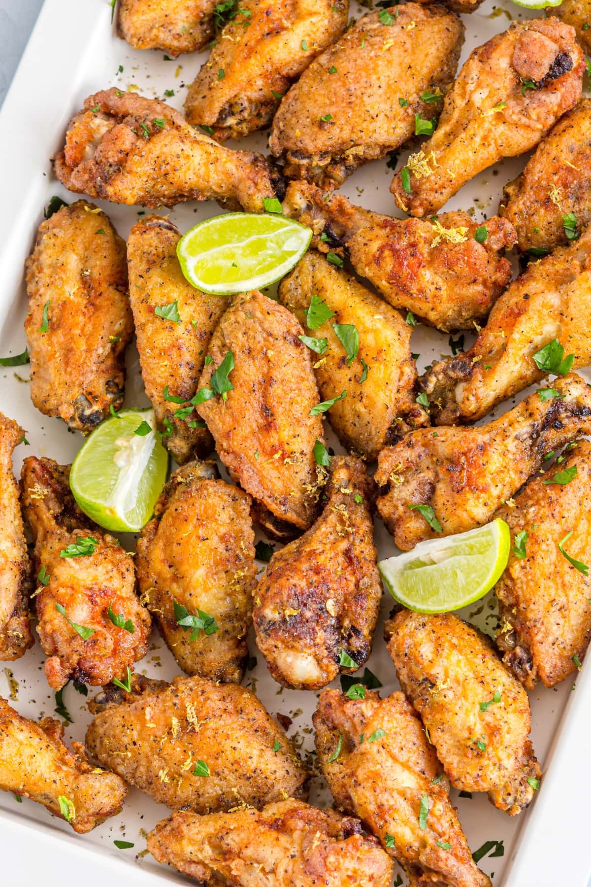 Homemade Lemon Pepper Wings with Herbs on a Baking Dish