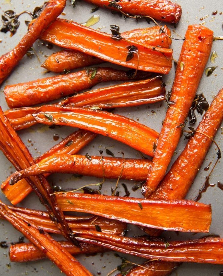 Honey roasted carrots with balsamic on a sheet pan. 