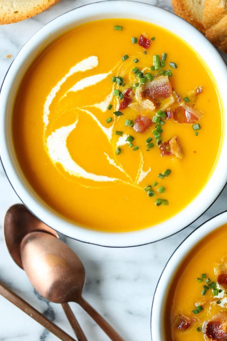 Bowl of Instant Pot Butternut Squash Soup top with bacon and fresh chives