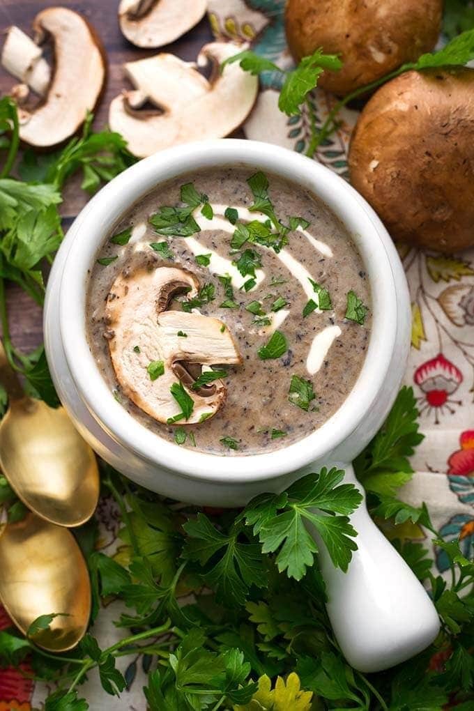 Bowl of homemade Instant Pot Mushroom Soup garnished with parsley