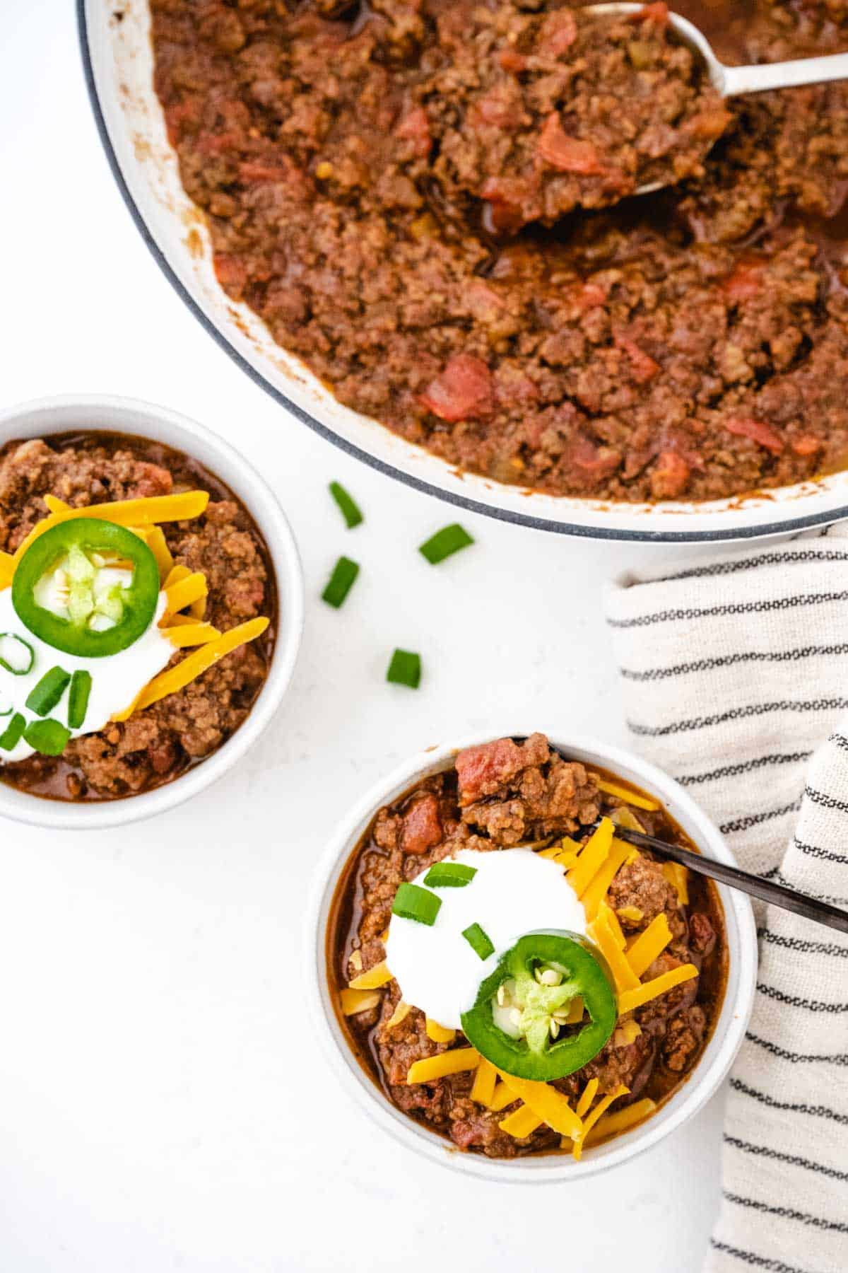 Low Carb Keto Chili with Groun Beef, Sour Cream, Bell Peppers and Shredded Cheese