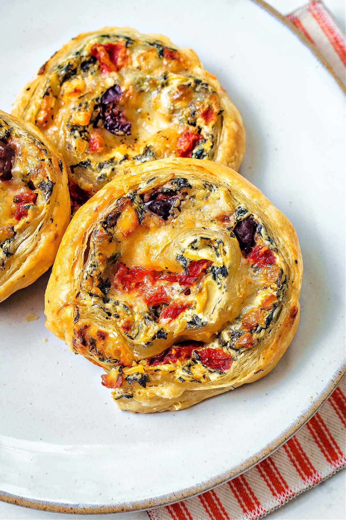Greek Puff Pastry Pinwheels with Olives, Spinach, Feta and Peppers