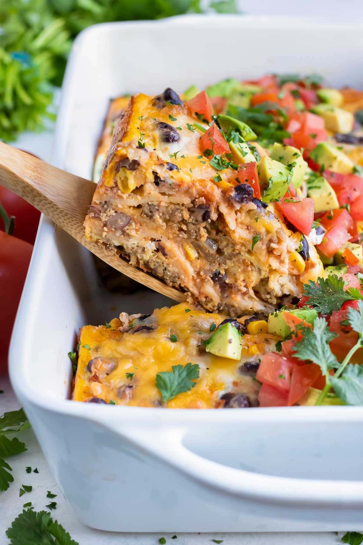 Mexican breakfast casserole made with black beans, fresh veggies, meat and eggs. 