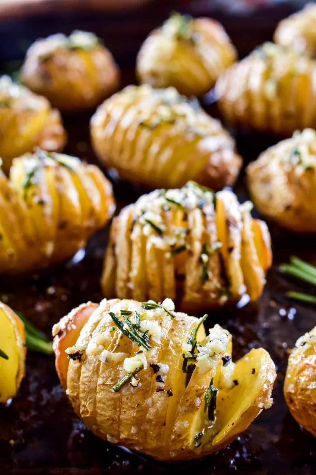 Roasted potatoes with garlic, herbs and sauce. 