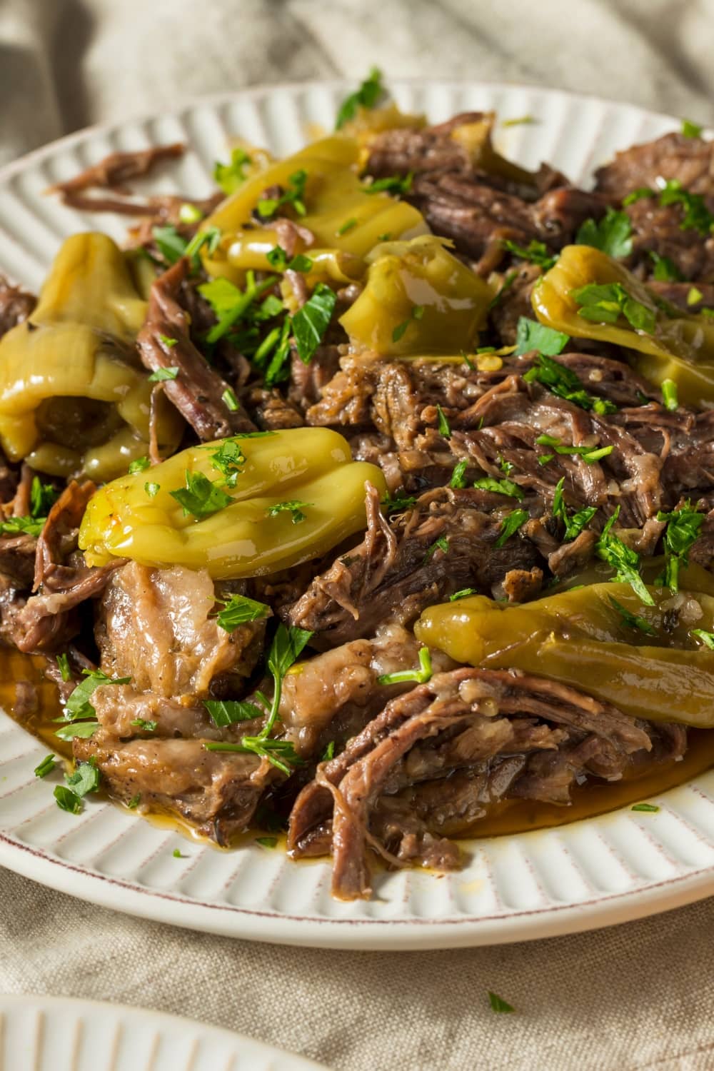 Closeup of Mississippi Pot Roast served on a white plate 