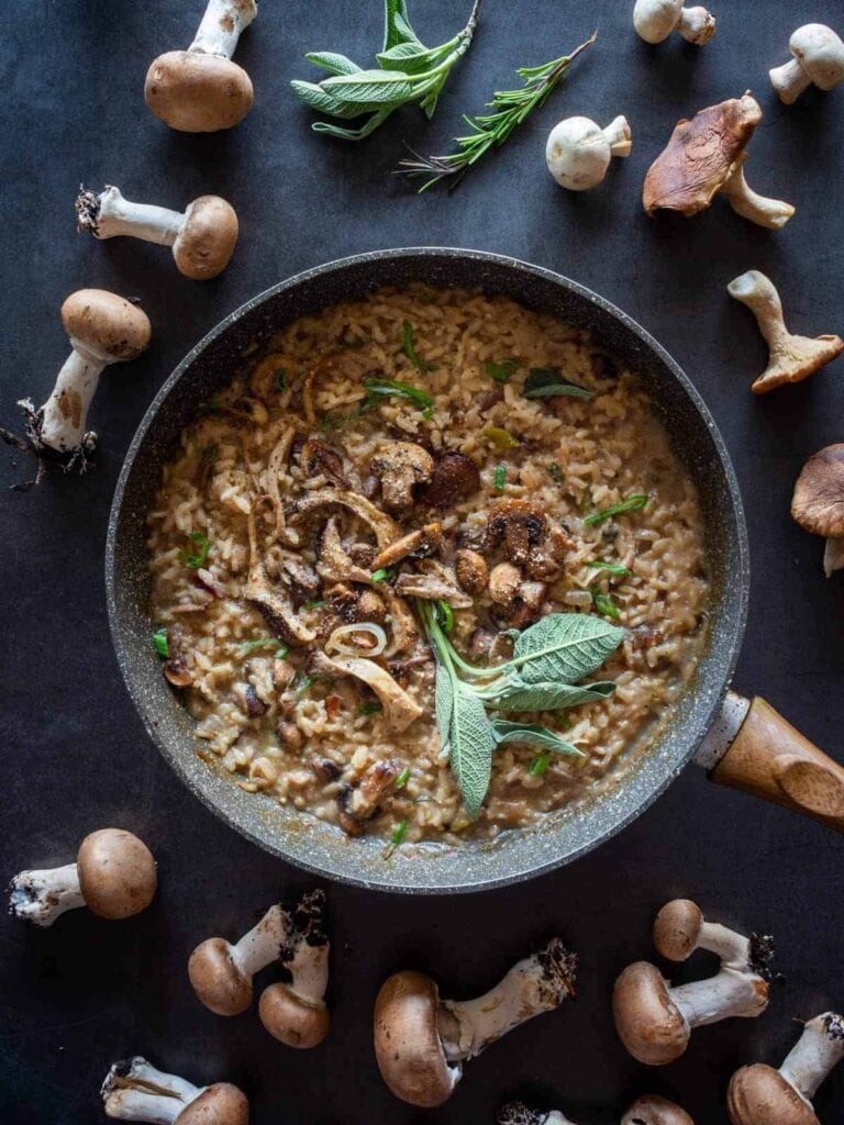 A pan filled with mushroom risotto.