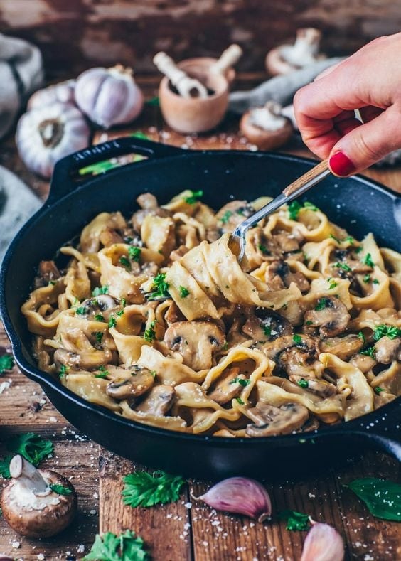 Mushroom pasta in a sklillet.