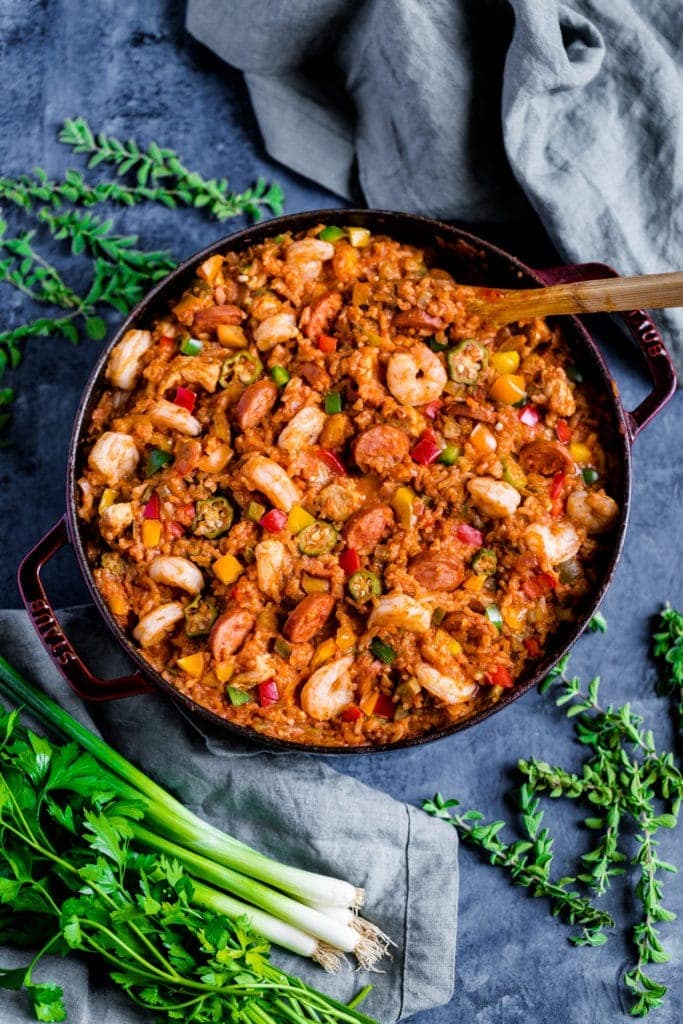 Chicken and shrimp jambalaya sizzling in a skillet