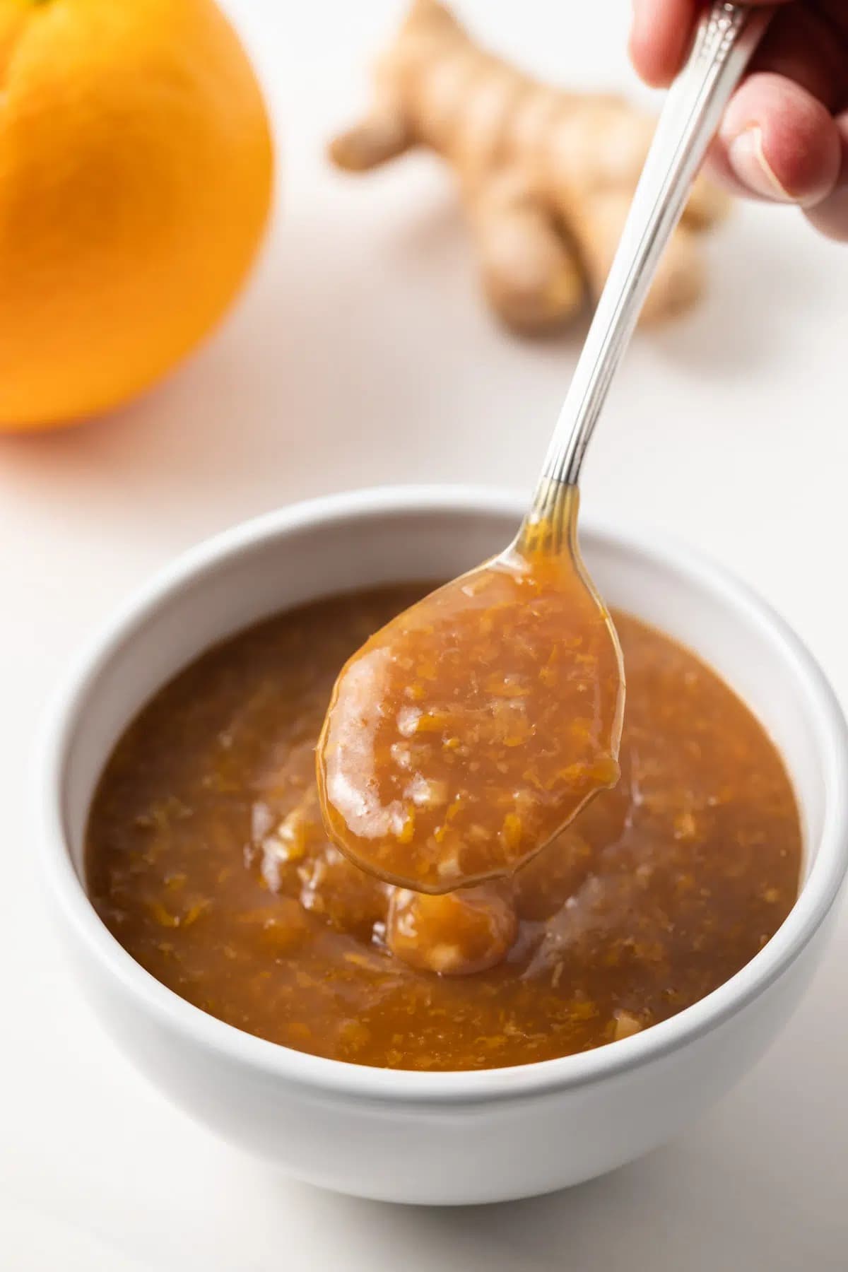 Sweet and Tangy Orange Ginger Sauce with Sesame in a Bowl 