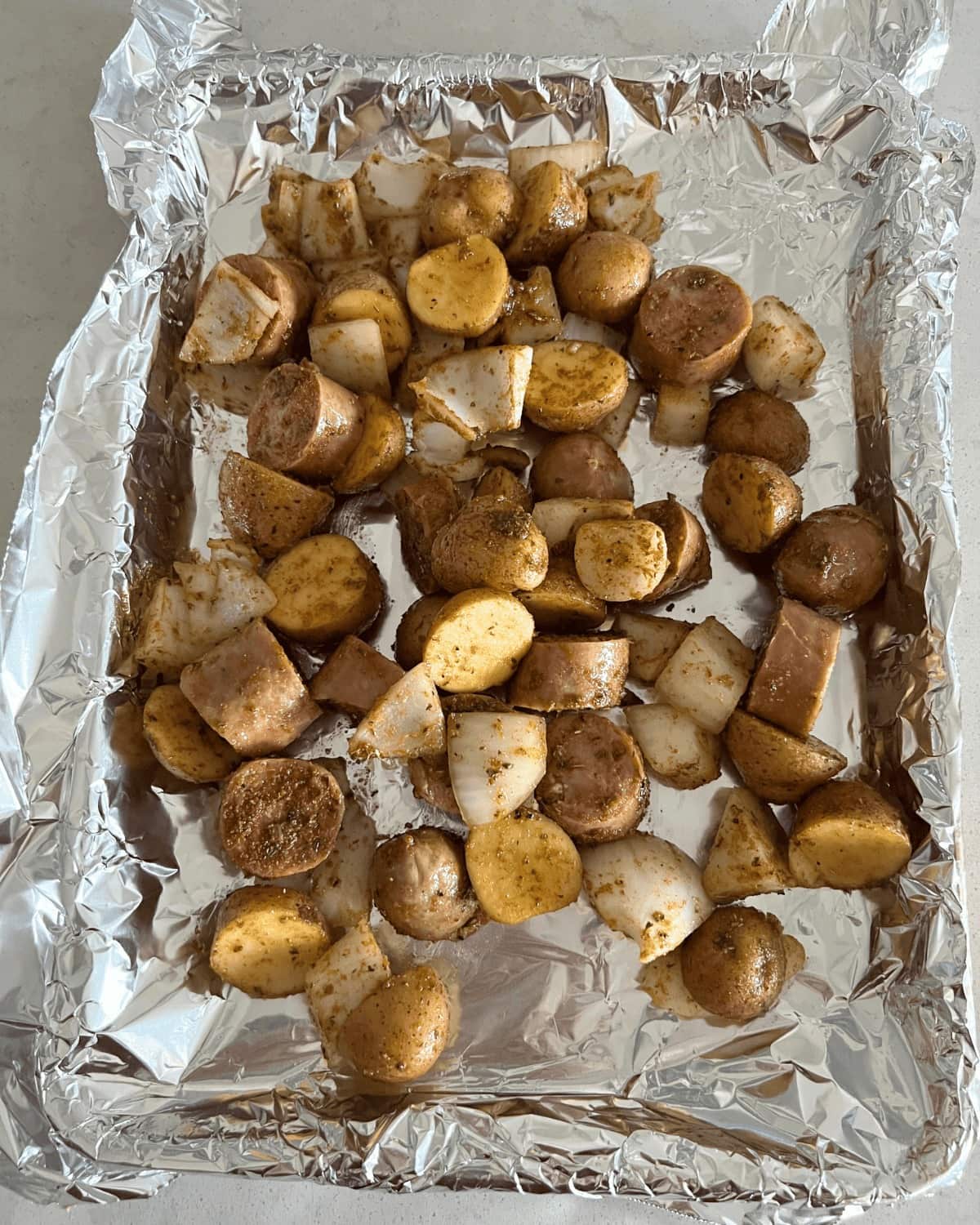 Oven Roasted Smoked Sausage and Potatoes with Spicy Seasonings