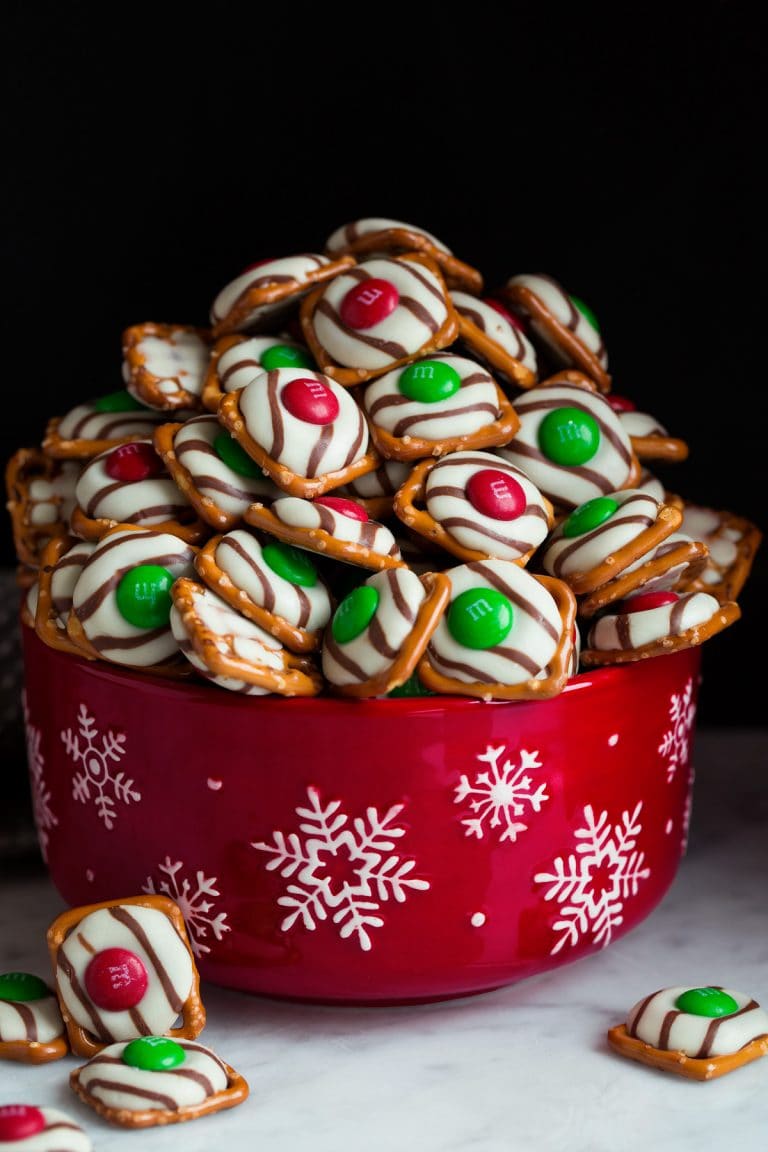 A festive bowl of Christmas pretzels adorned with candy canes, perfect for holiday snacking