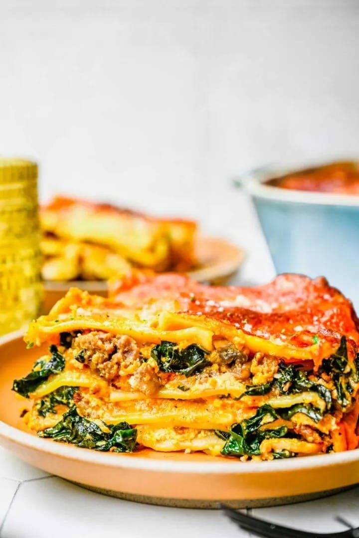 Pumpkin lasagna with sausage and kale.