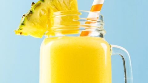 Refreshing Pineapple Smoothie with Fresh Fruit in a Glass Jar