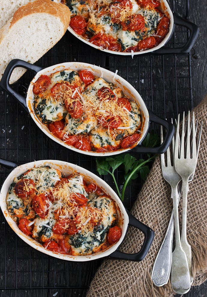 Homemade Spinach and Ricotta Gnudi with Tomato Sauce in Small Casseroles