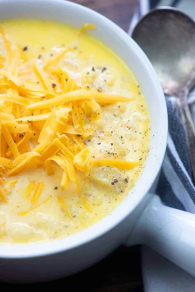 Bowl of Warm Roasted Cauliflower Soup with Cheddar