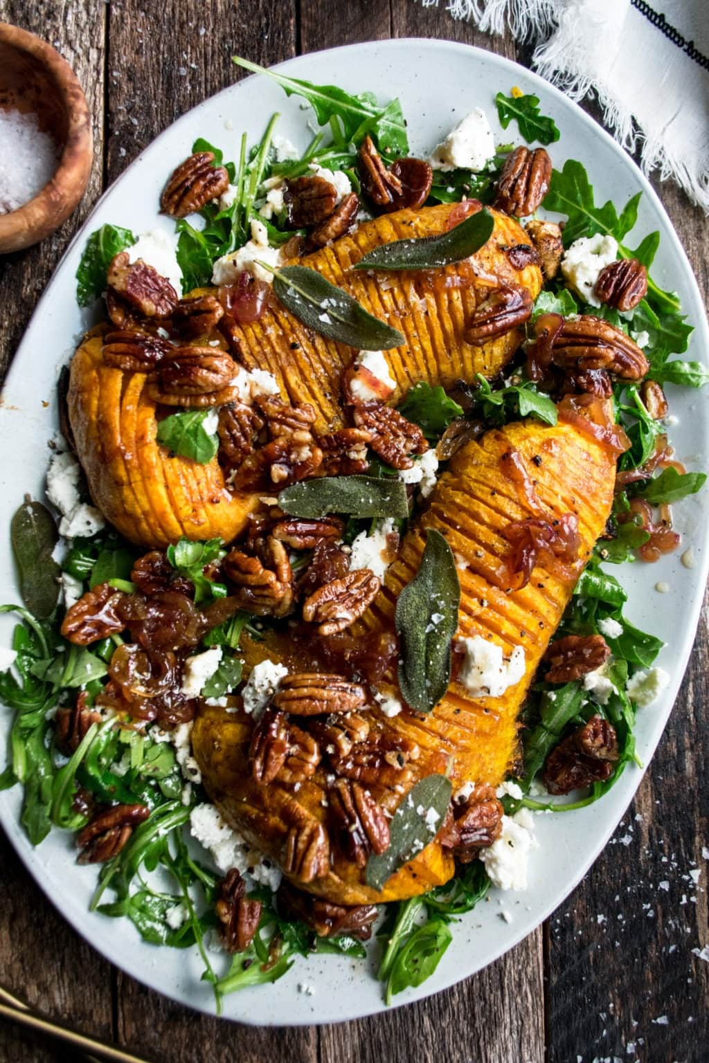 Roasted Hasselback Butternut Squash Salad  with goat cheese and maple pecans