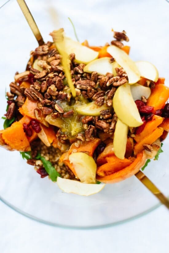Roasted butternut squash & apple salad in a glass bowl. 