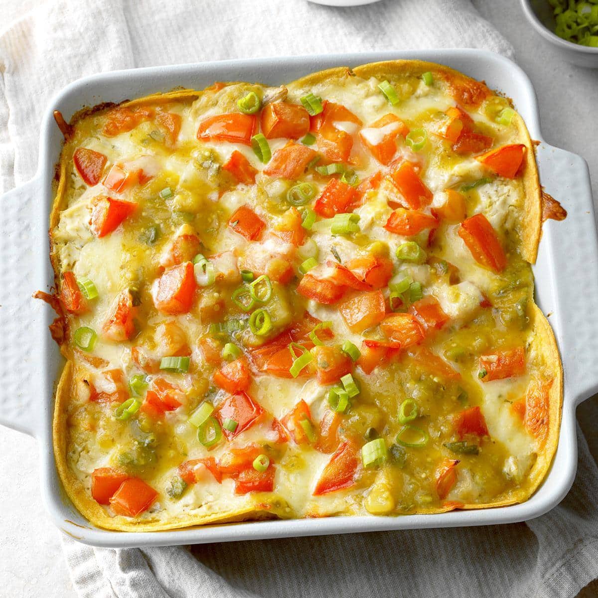 Vegetable and cheese casserole with carrots and scallions