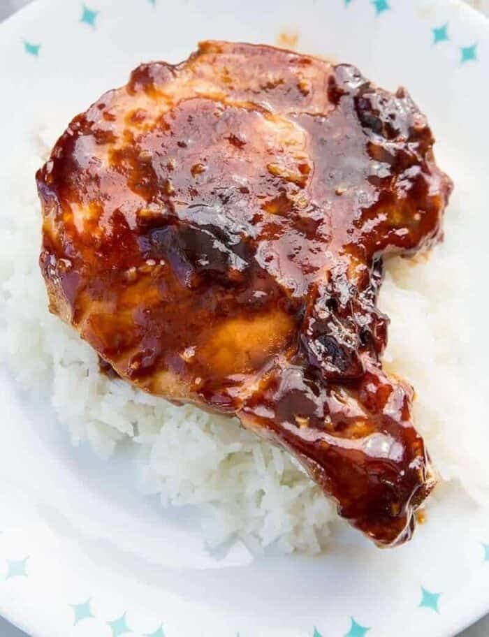Rice topped with saucy brown sugar baked pork chops. 