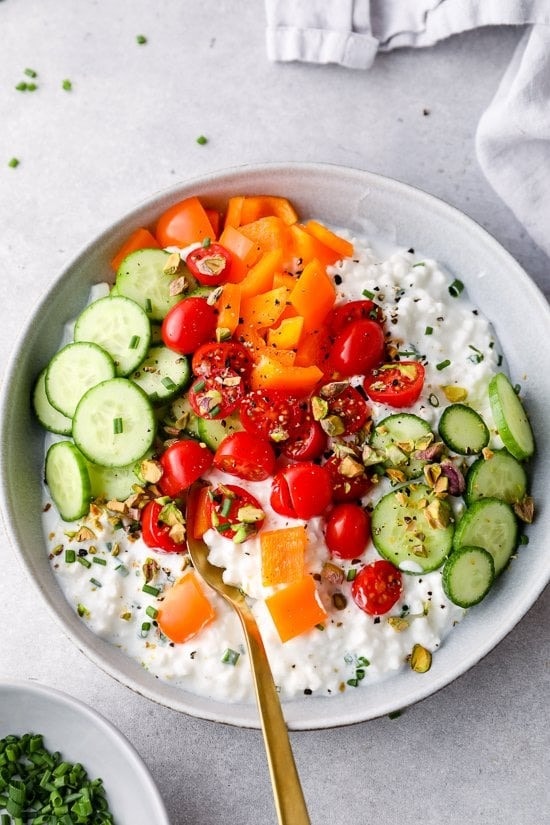 Bowl of Savory Cottage Cheese Bowls with cucumbers, tomatoes and bell peppers