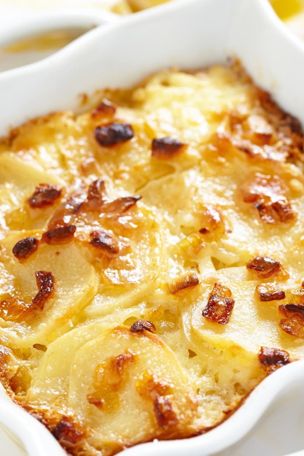 Close up view of Scalloped Potatoes on casserole