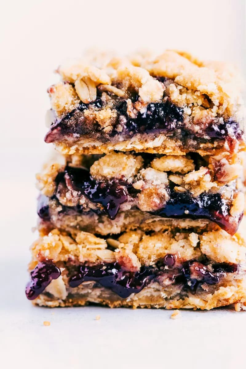 Close up view of stacks of Simple Oatmeal Cookie Jam Bars