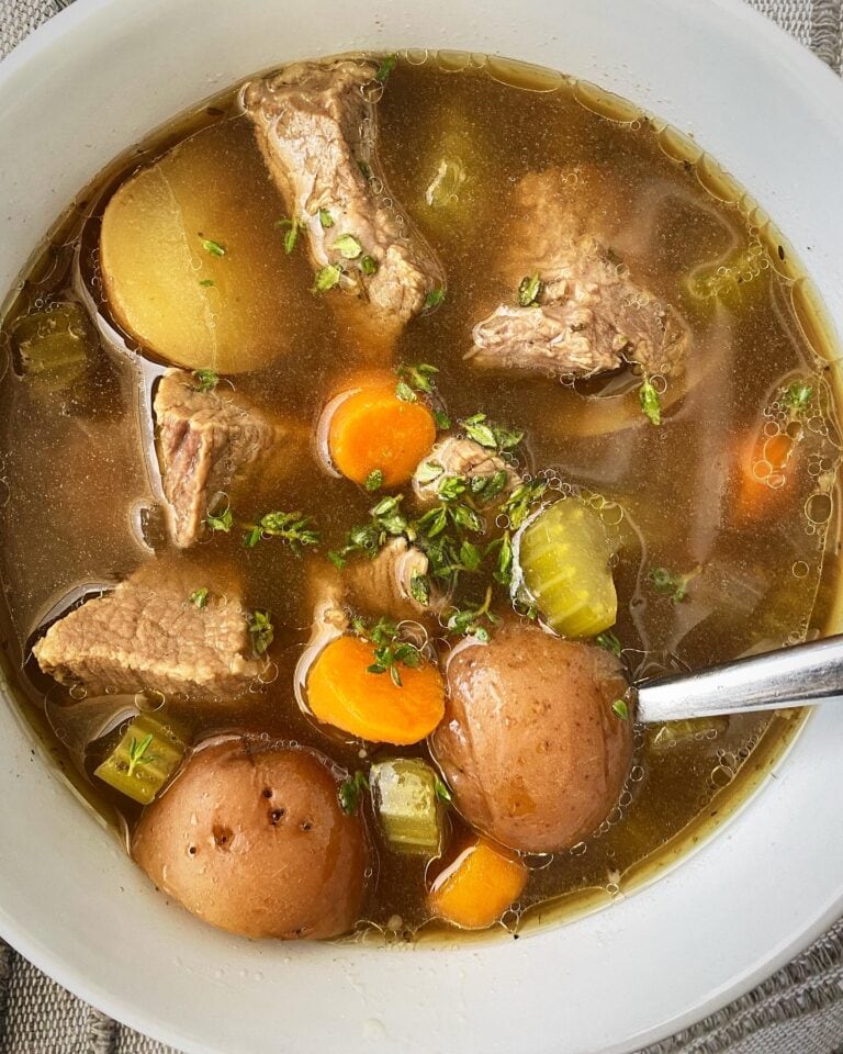 A hearty and flavorful pot roast soup with tender beef, vegetables, and savory broth