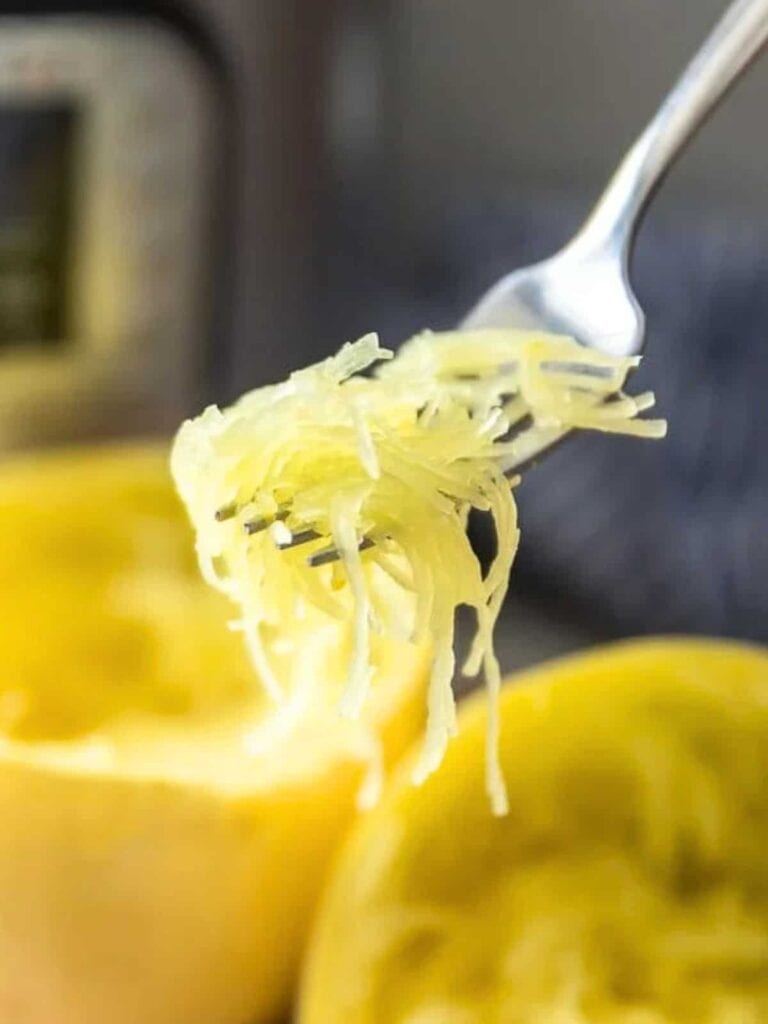 Squash spaghetti in fork. 