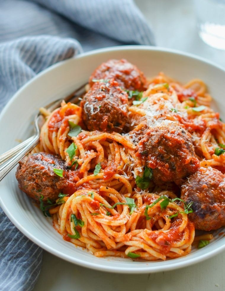 Homemade Spaghetti and Meatballs in Tomato Sauce with Parsley