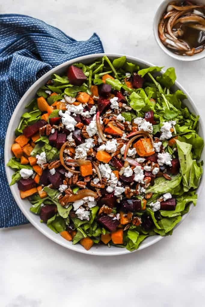 Beetroot and sweet potato salad with crunchy pecans or walnuts and feta cheese