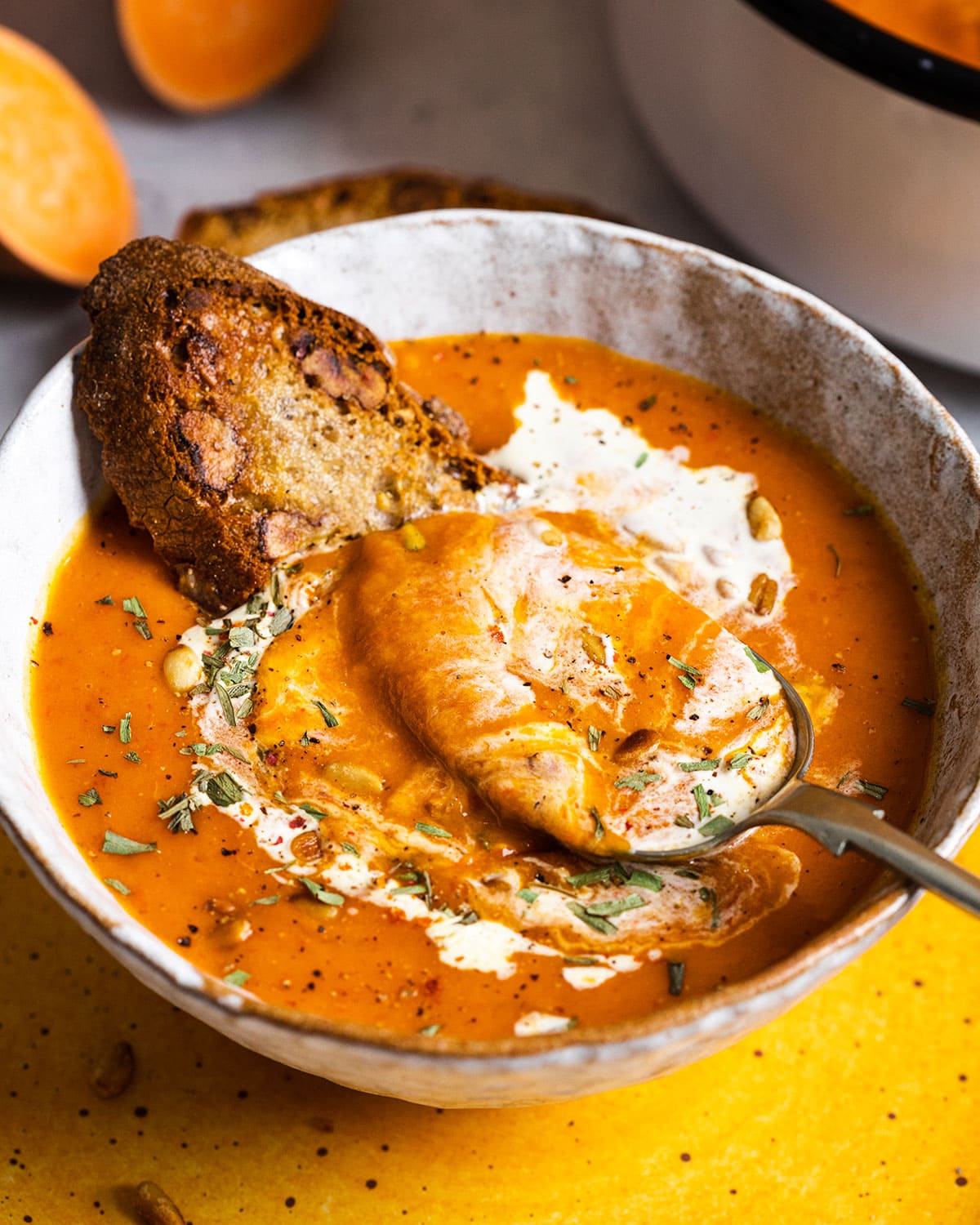 Creamy Red Pepper Soup with Sweet Potatoes in a Bowl