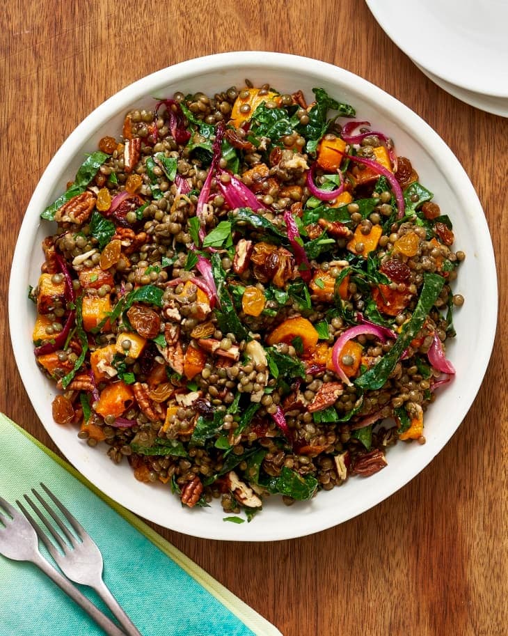 Thanksgiving Lentil Salad with caramelized butternut squash, toasted pecans, sweet raisins, kale, and red onion