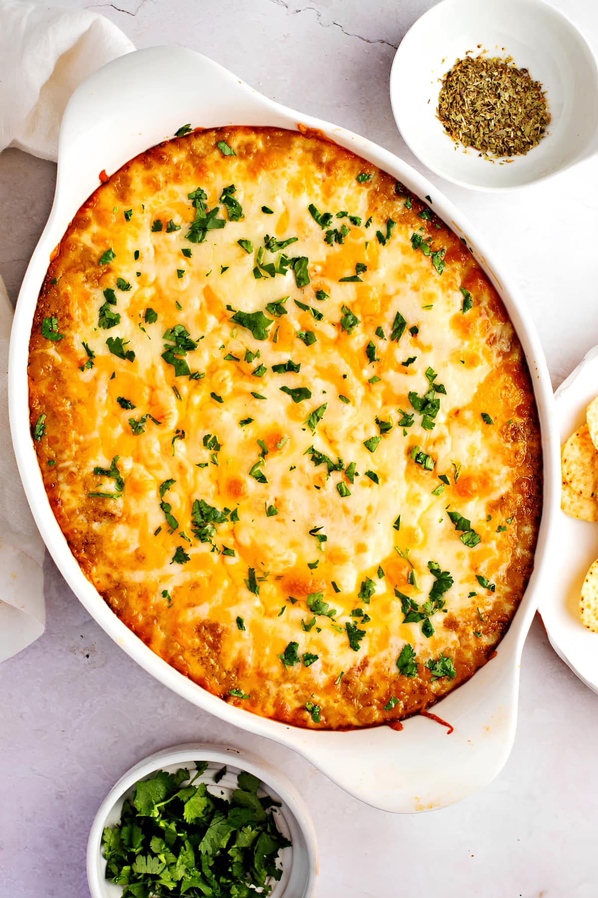 Thick and Creamy Hot Bean Dip in a White Casserole