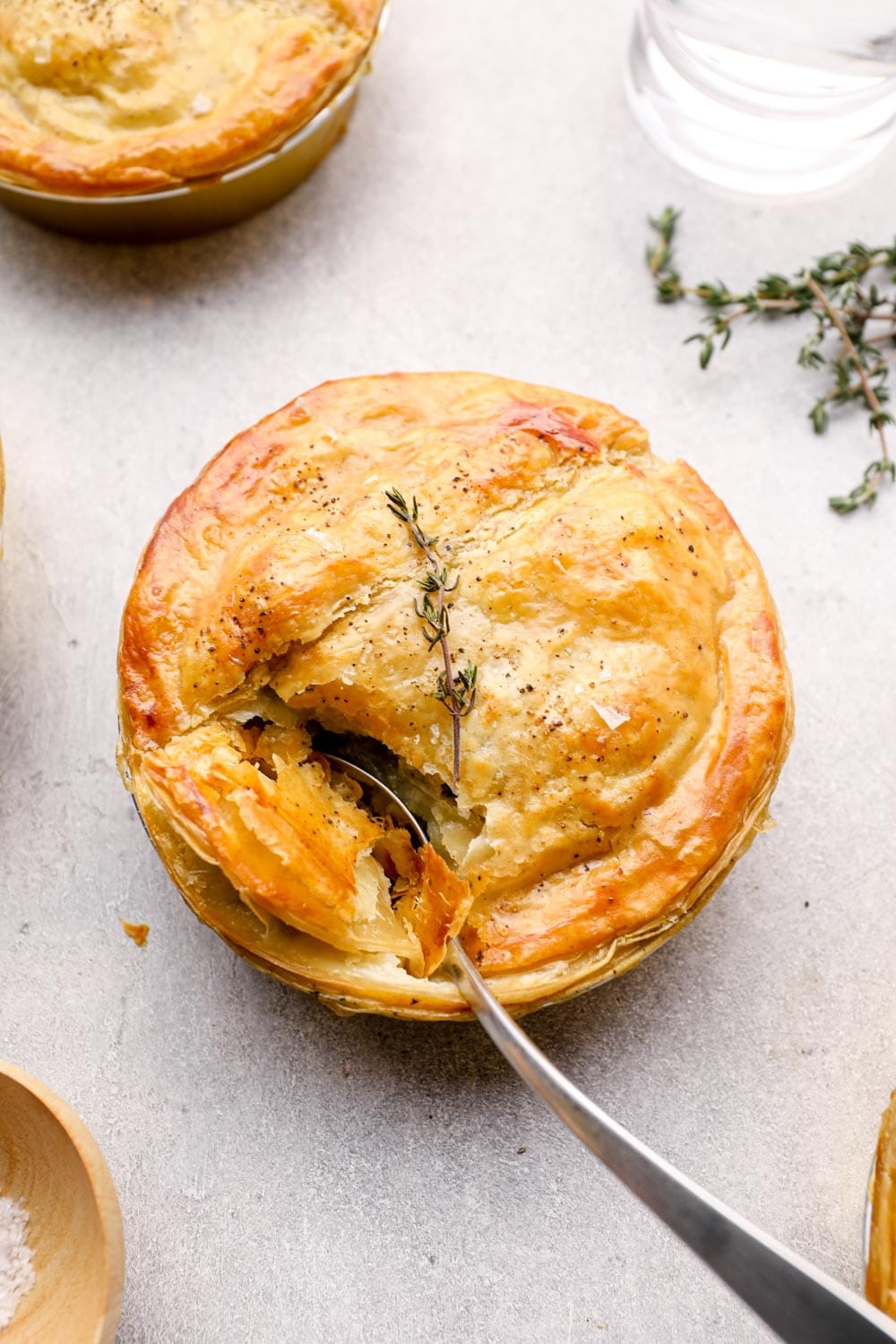 A savory pie topped with flavorful herbs and spices.