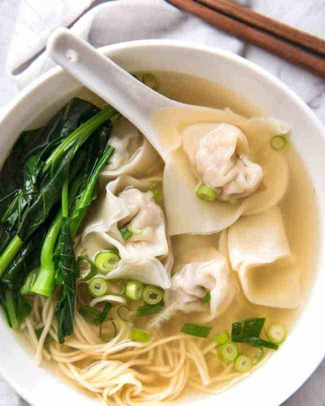 Wonton Soup with Scallions and Bok Choy in a Bowl