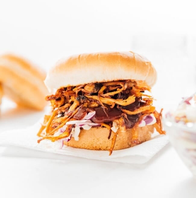 Pulled mushroom served in a bun with coleslaw. 