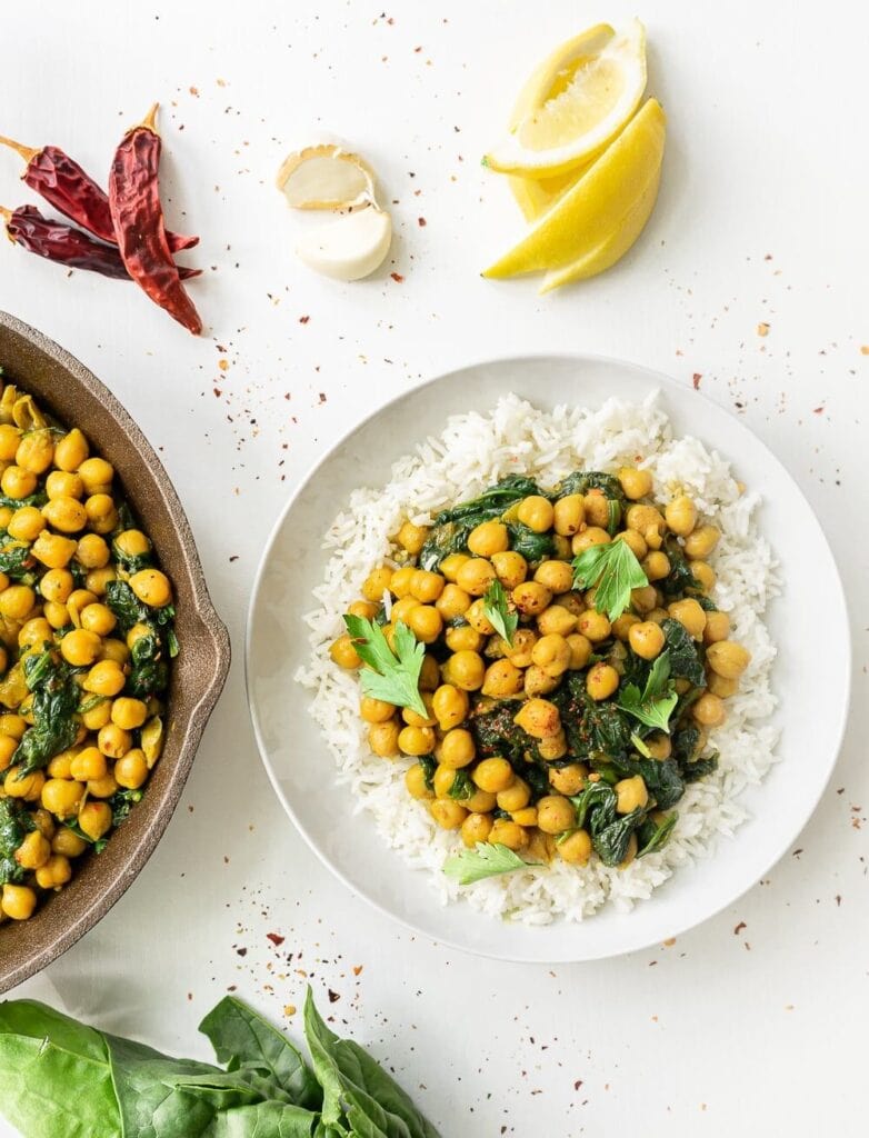Chickpea curry topped on white rice. 