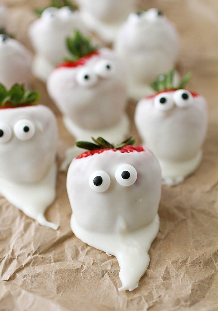 White chocolate covered strawberries with candy eyes. 
