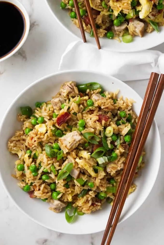 Mouth-watering fried rice with tender pork and fresh peas.